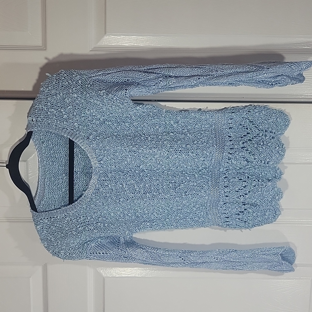 Handmade knitted light blue sweater